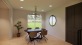 large dining room with recessed lighting